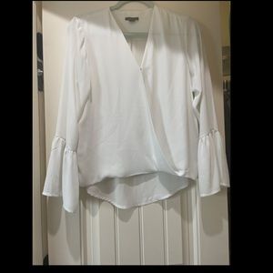 Cute long sleeve blouse with bell sleeve detail